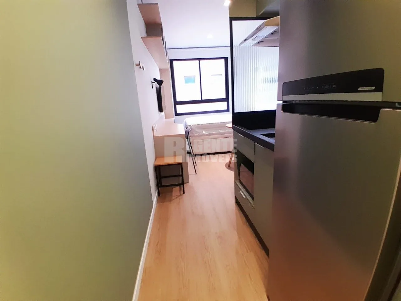Меблированная студия 20 м² с кухней открытой планировки — photo 15