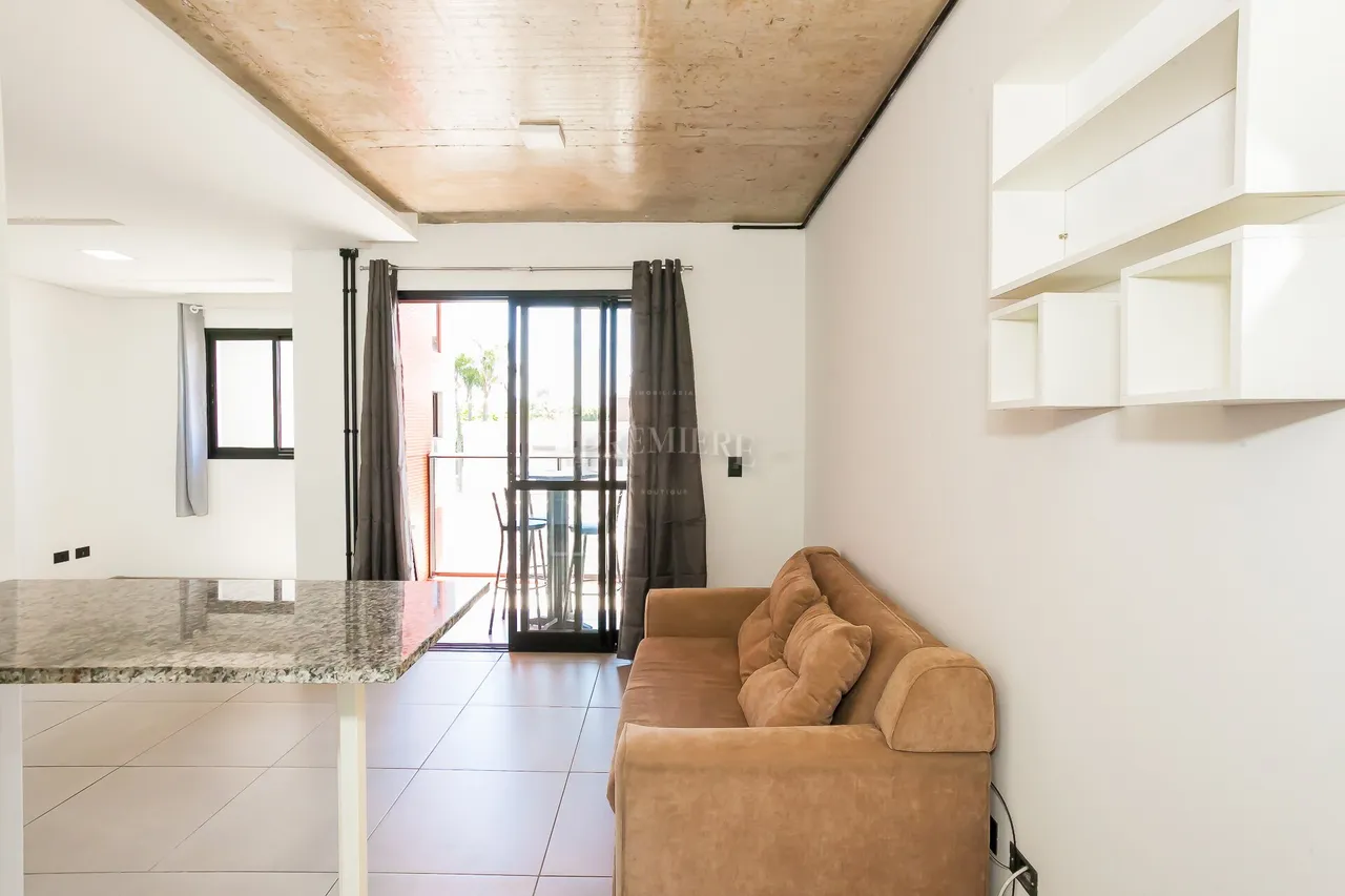 Estudio con cocina abierta y muebles empotrados — photo 4
