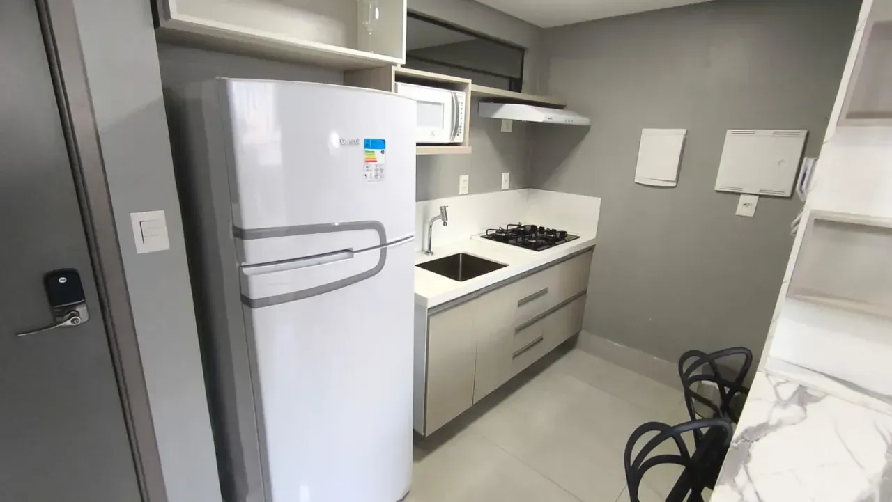 2-bedroom apartment in a building with a pool — photo 2
