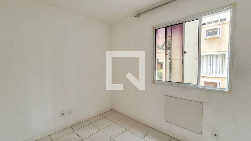 2-bedroom apartment in a building with a pool — photo 14