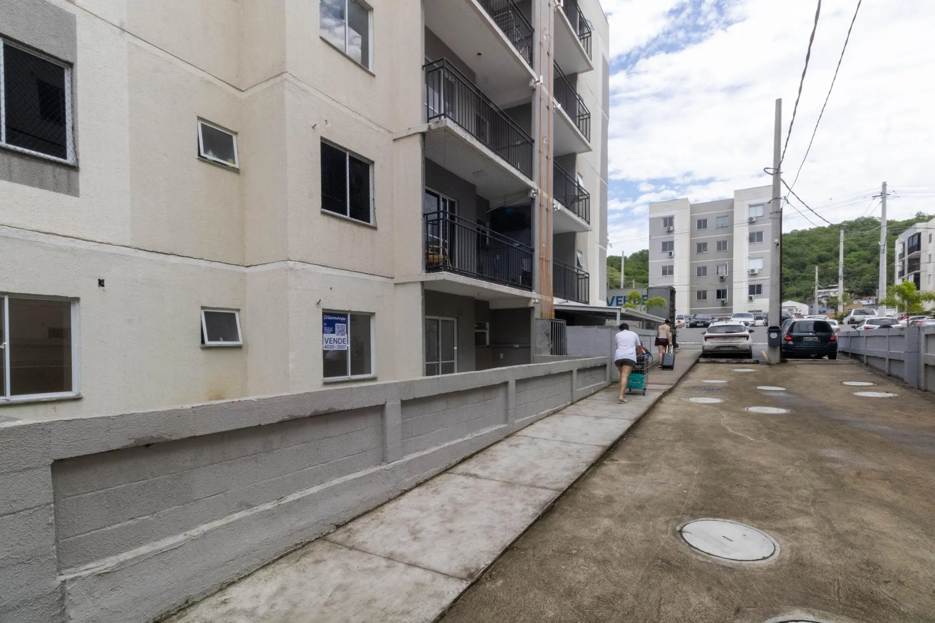 2-bedroom apartment in a building with a pool — photo 16