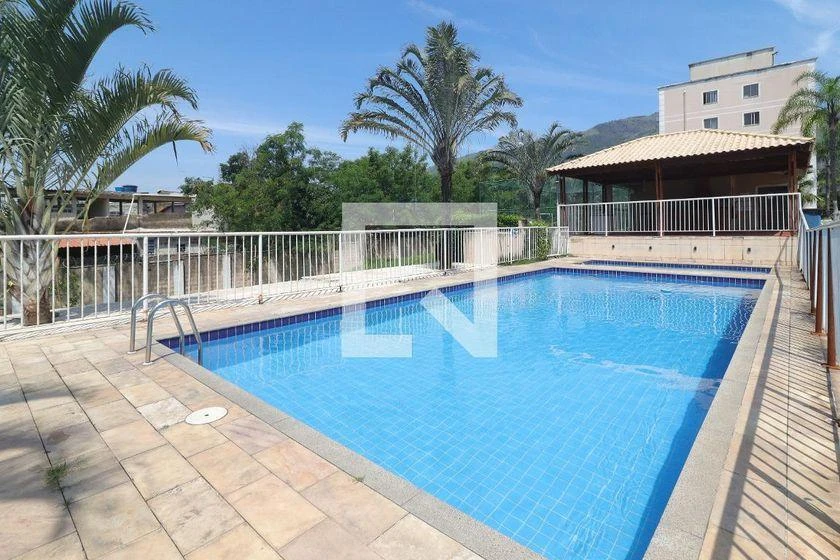 2-bedroom apartment in a building with a pool — photo 5