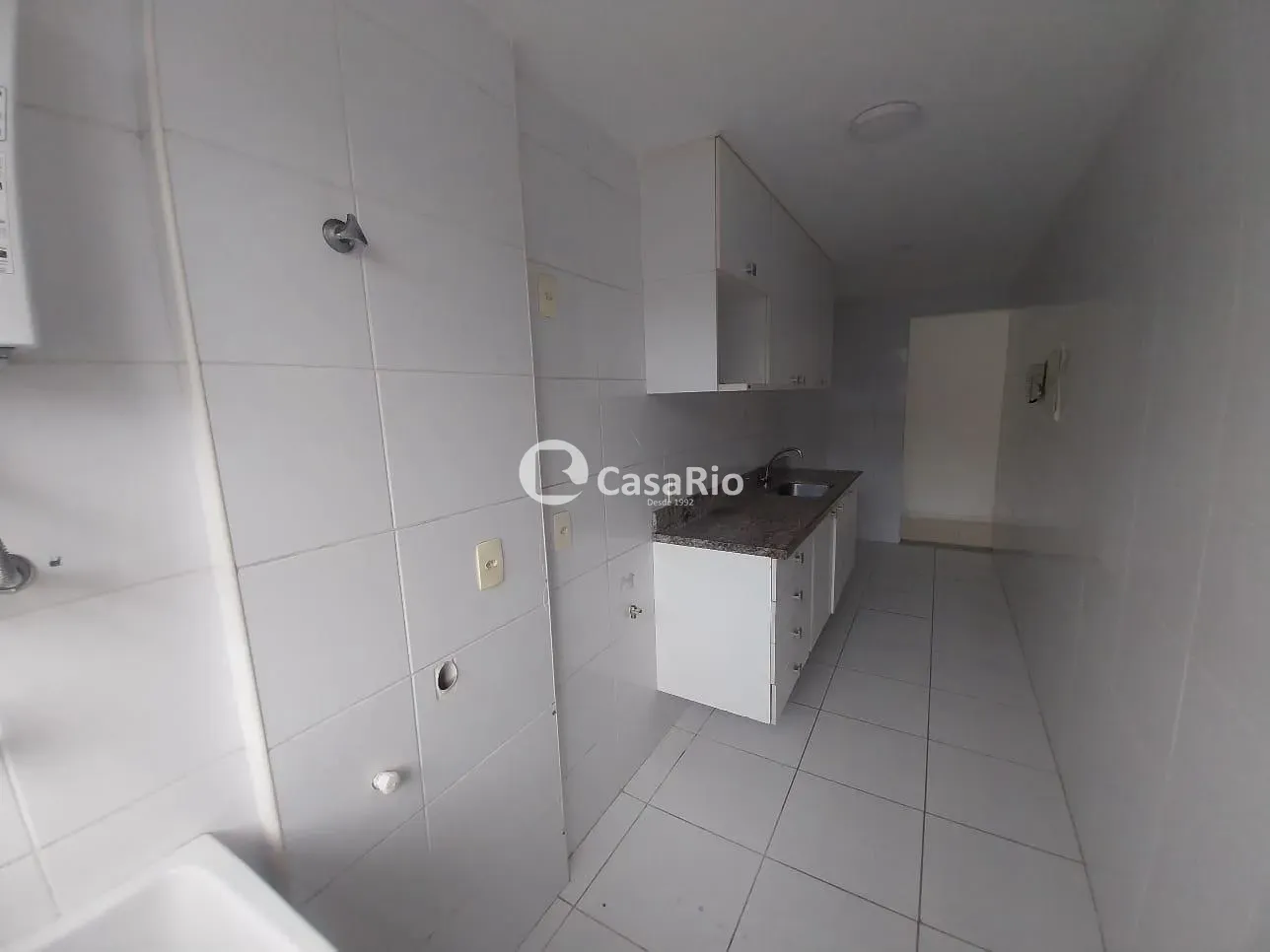 2-bedroom apartment in a building with a pool — photo 16