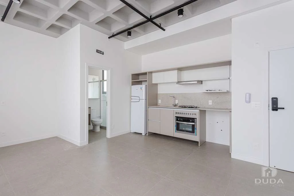 1-bedroom apartment with open-plan kitchen and parking