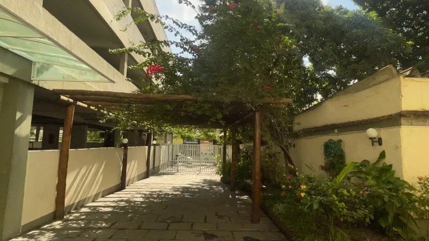 2-bedroom apartment in a building with a pool — photo 10