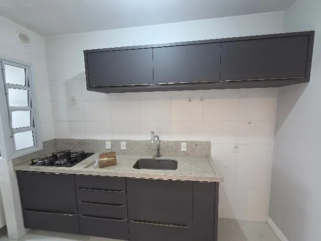One-bedroom apartment in a building with a gym
