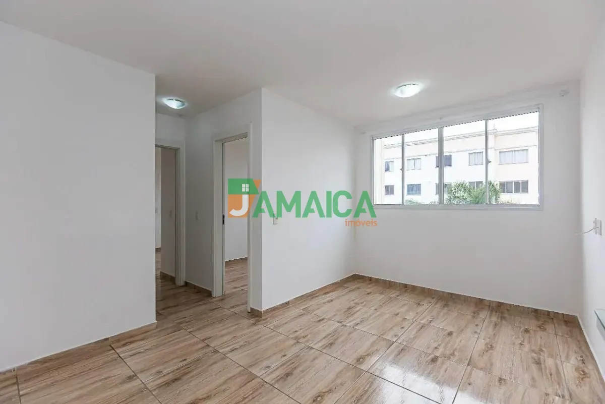 2-bedroom apartment in a building with a pool
