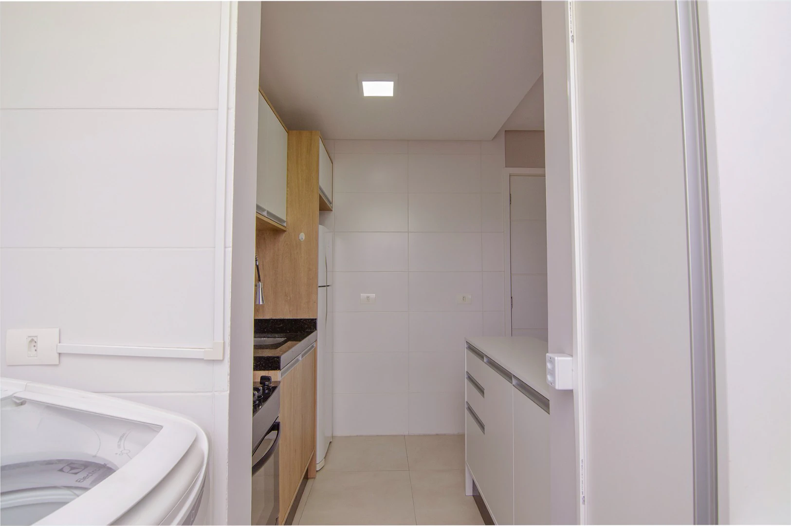 One-bedroom apartment with a washing machine in Curitiba — photo 3