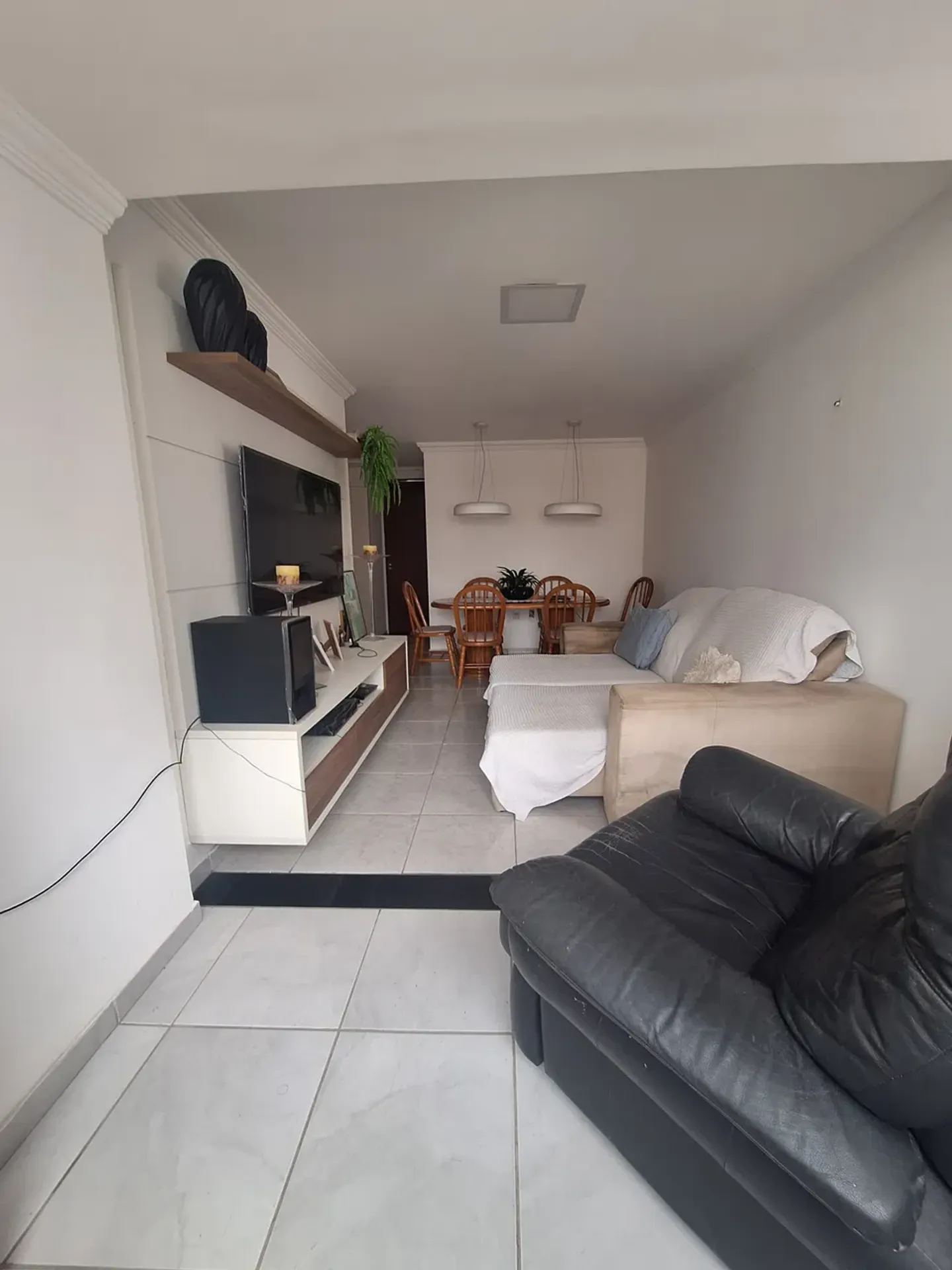3-bedroom apartment in a building with a pool