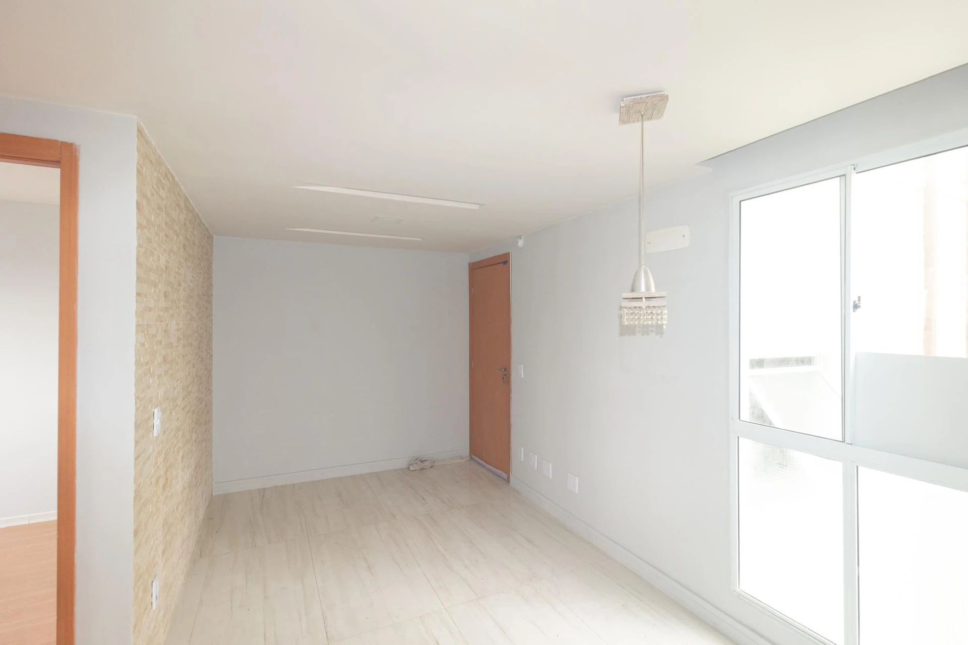 2-bedroom apartment in a building with a pool