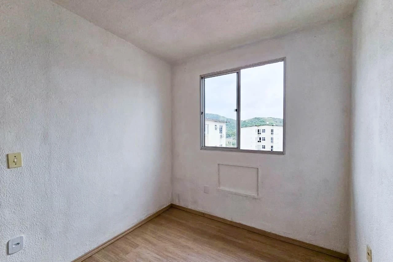 2-bedroom apartment in a building with a pool