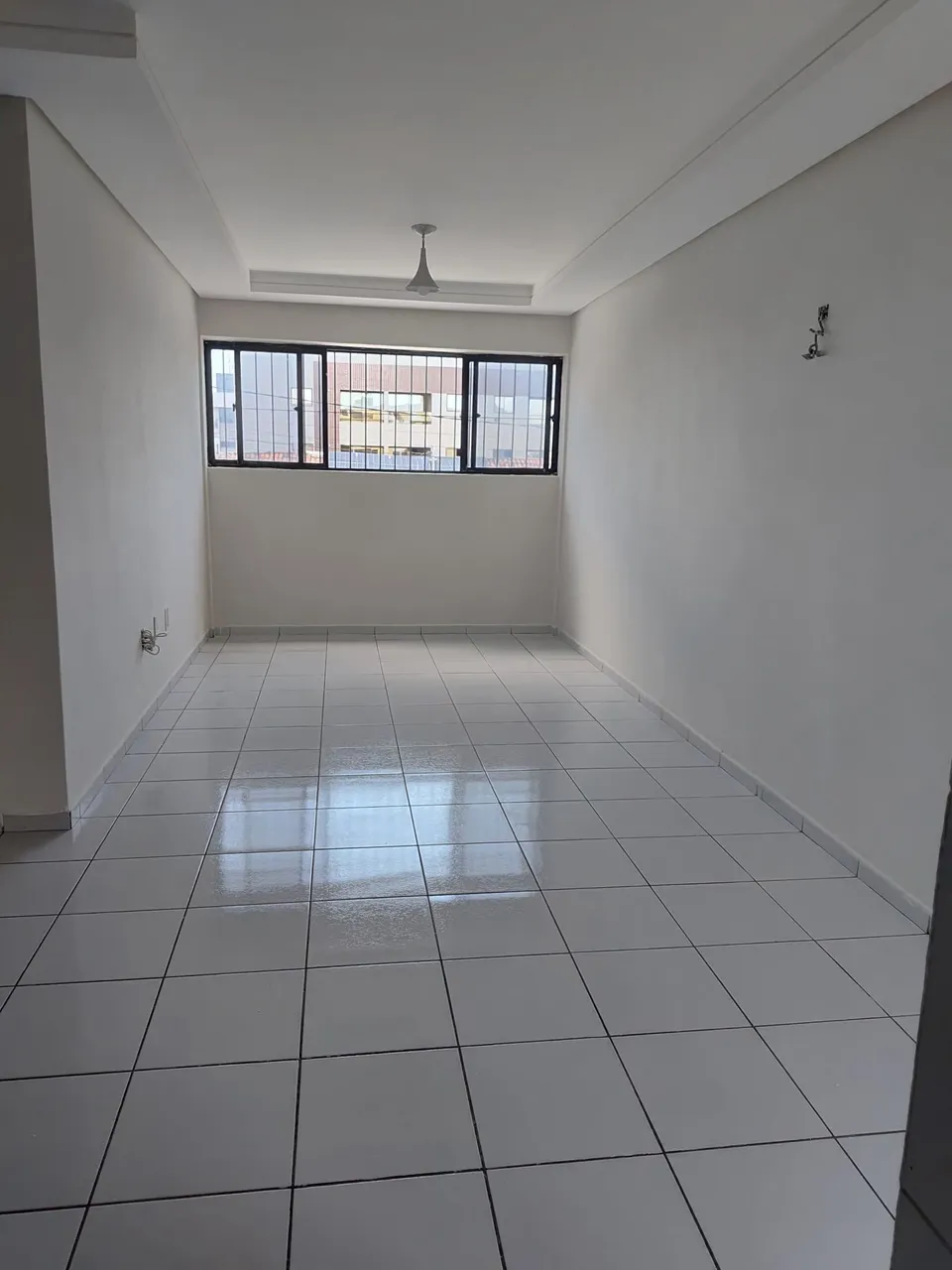 3-bedroom apartment in a building with a pool