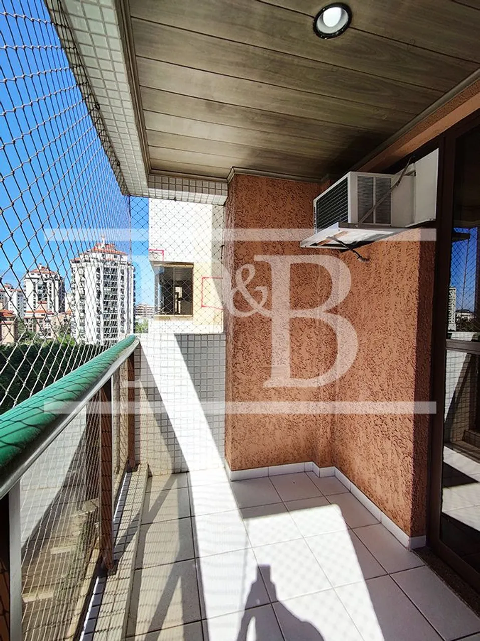2-bedroom apartment in a building with a pool — photo 16