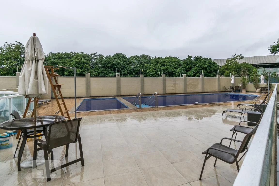 2-bedroom apartment in a building with a pool — photo 26