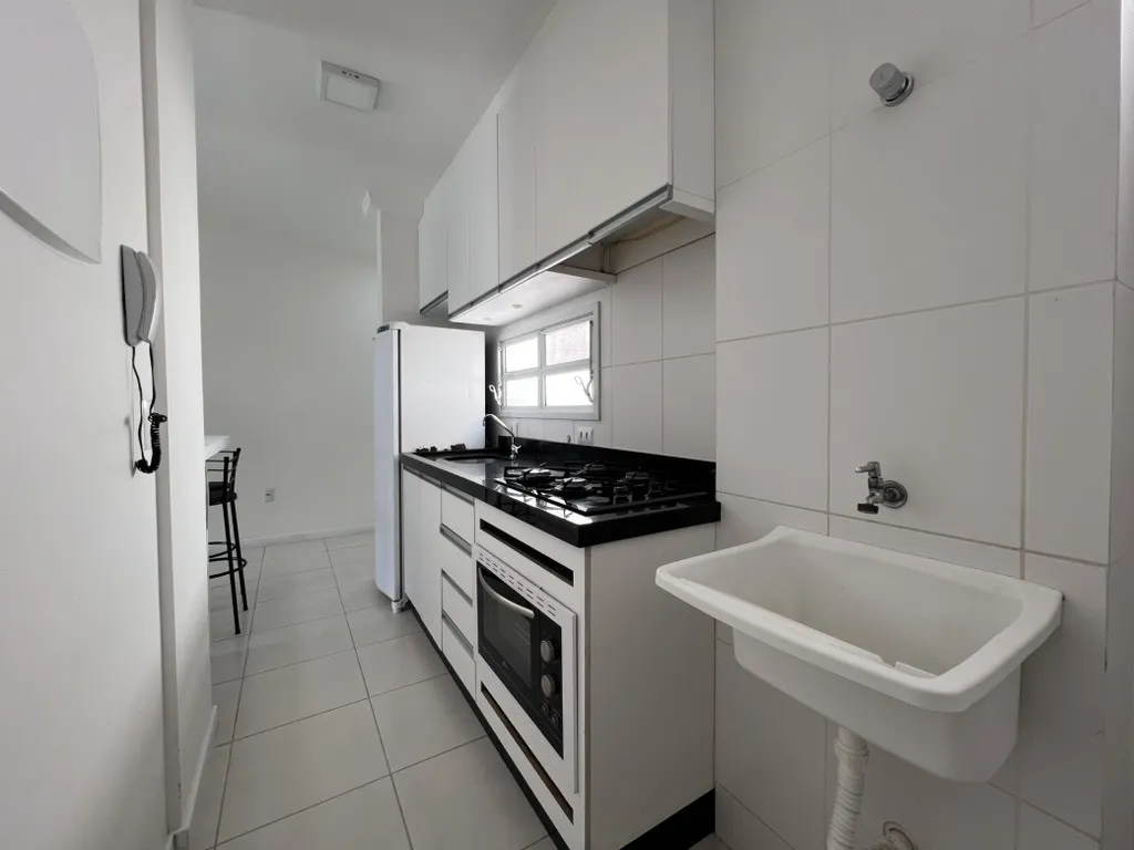 One-bedroom apartment in a building with a pool — photo 4