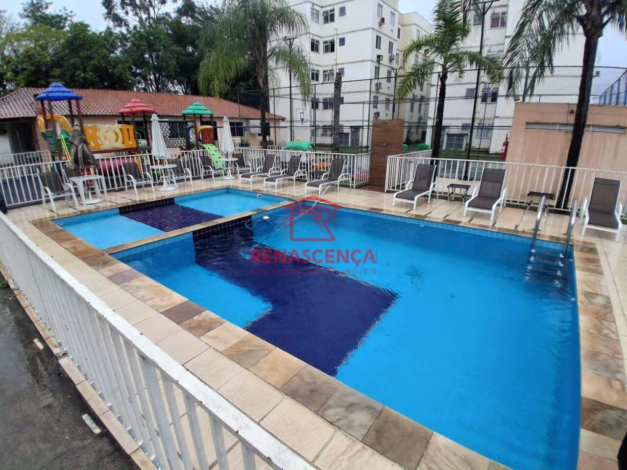 2-bedroom apartment in a building with a pool — photo 19
