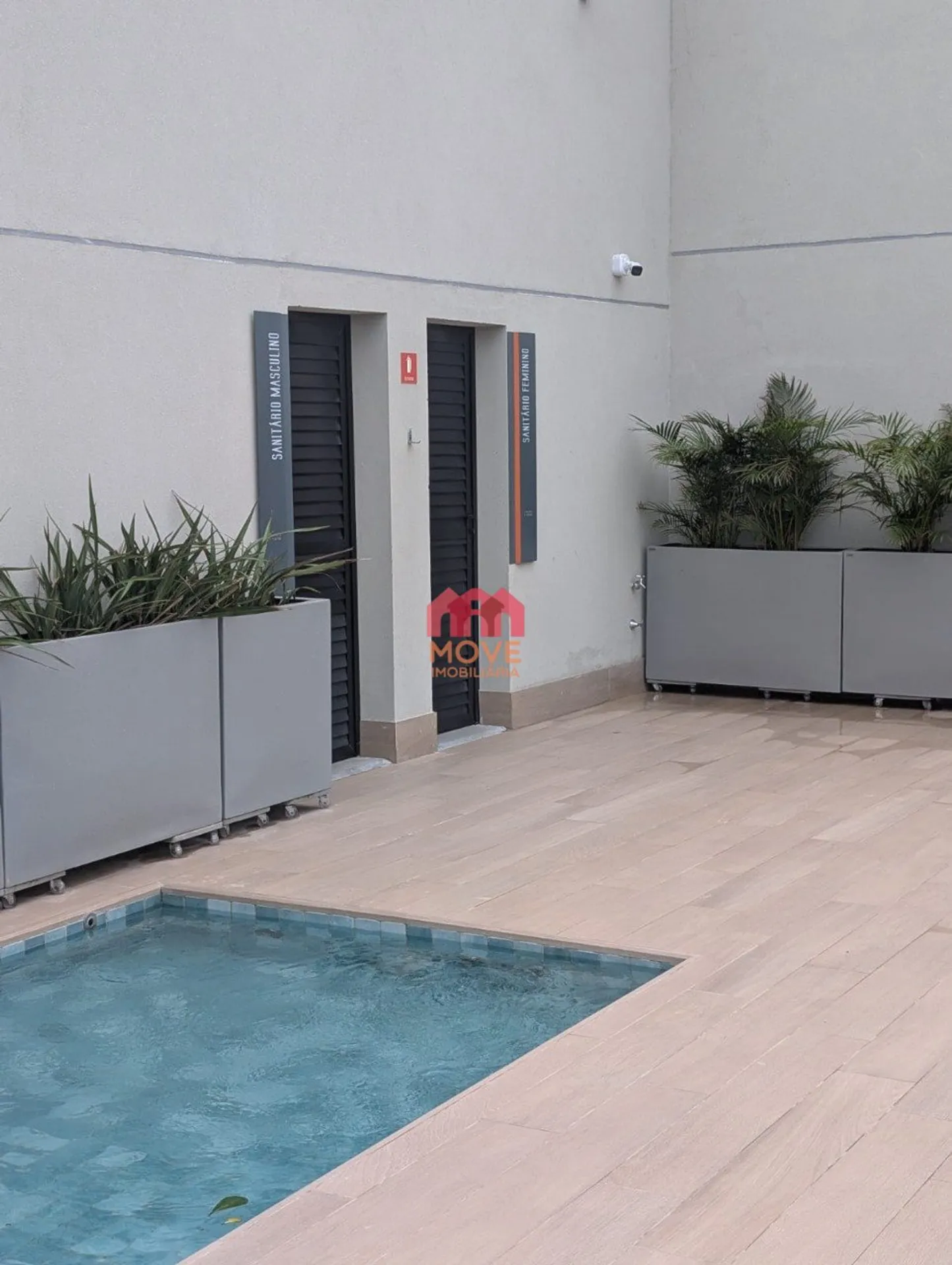 2-bedroom apartment in a building with a pool — photo 40