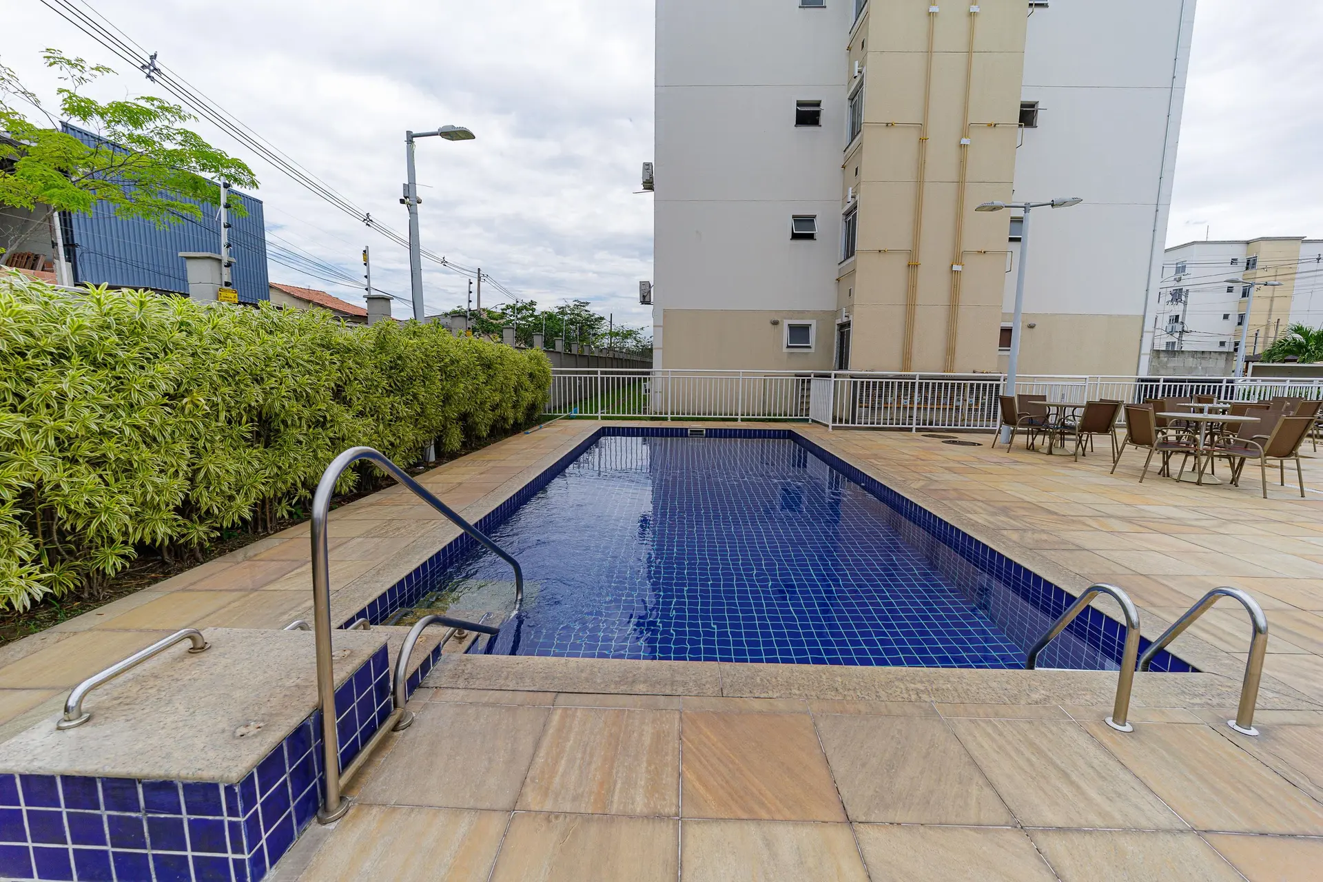 2-bedroom apartment in a building with a pool — photo 23