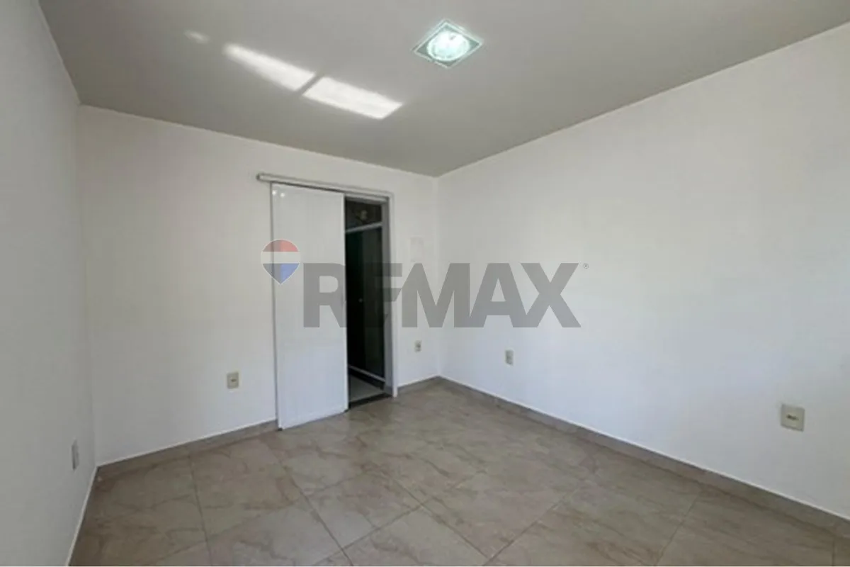 Balcony with a grill in a 3-bedroom house, 104 m² — photo 13