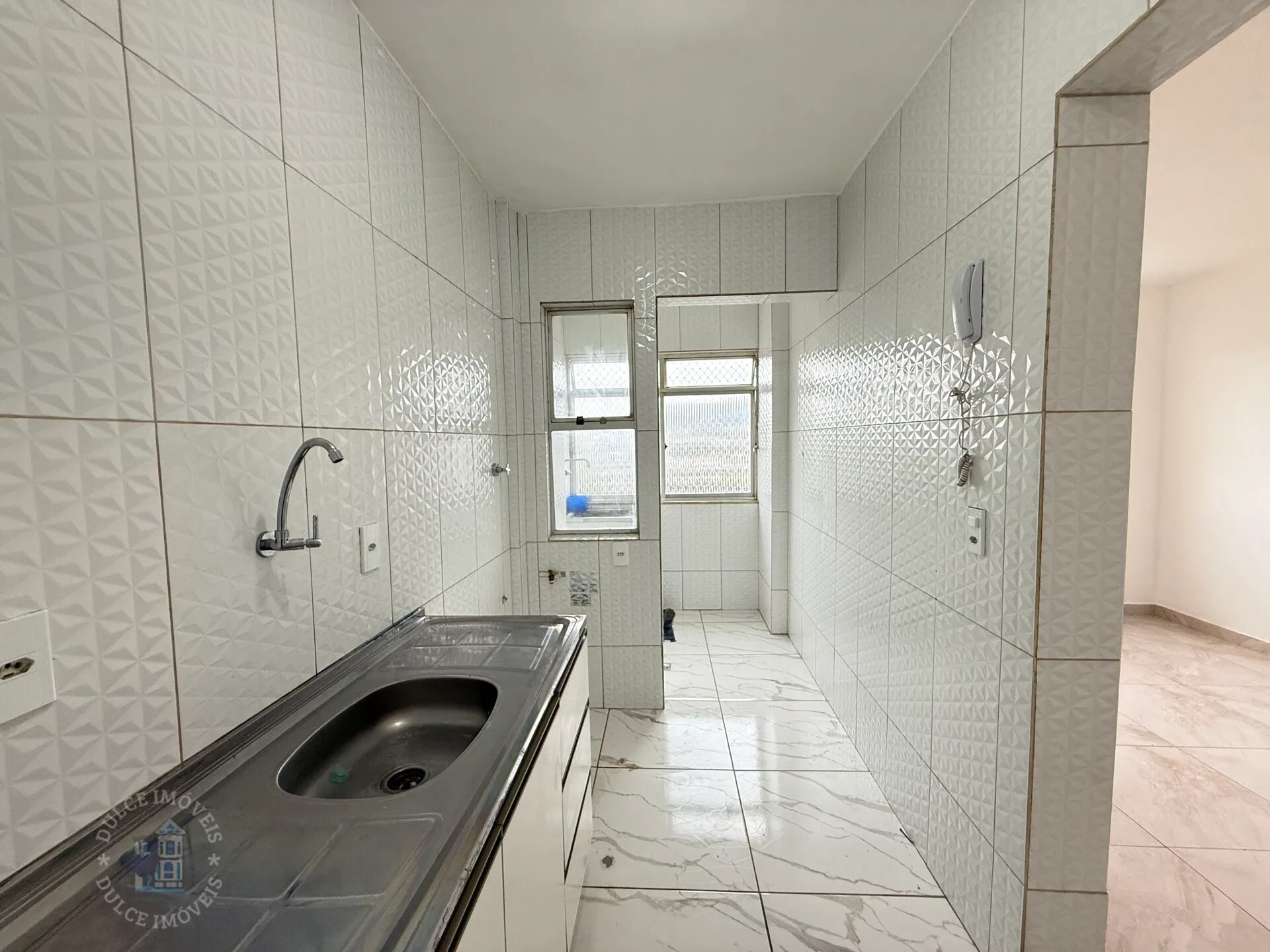 2-bedroom apartment in a building with a pool — photo 2
