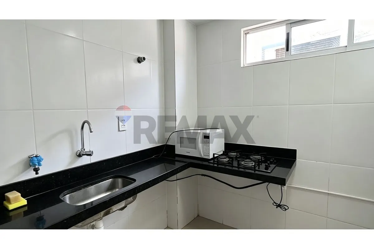 One-bedroom apartment in a building with a pool — photo 3