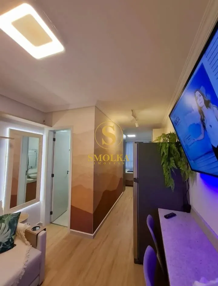Furnished studio with integrated kitchen and glass shower — photo 5