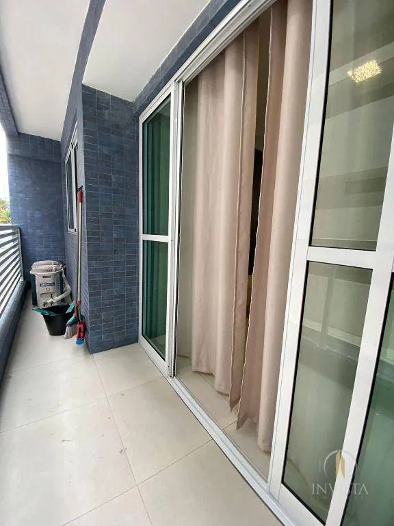 2-bedroom apartment in a building with a pool — photo 8