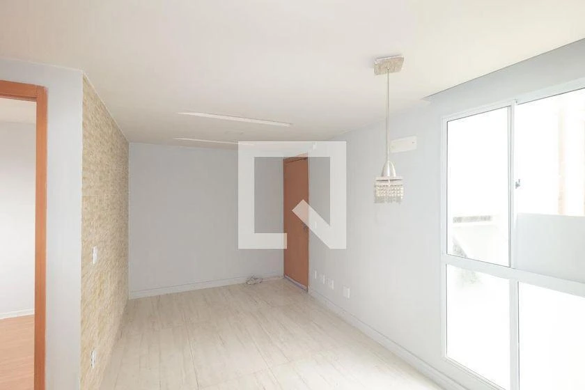 2-bedroom apartment in a building with a pool