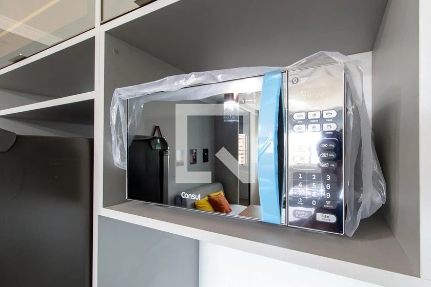 Studio mobiliado com quarto e cozinha integrada — photo 11