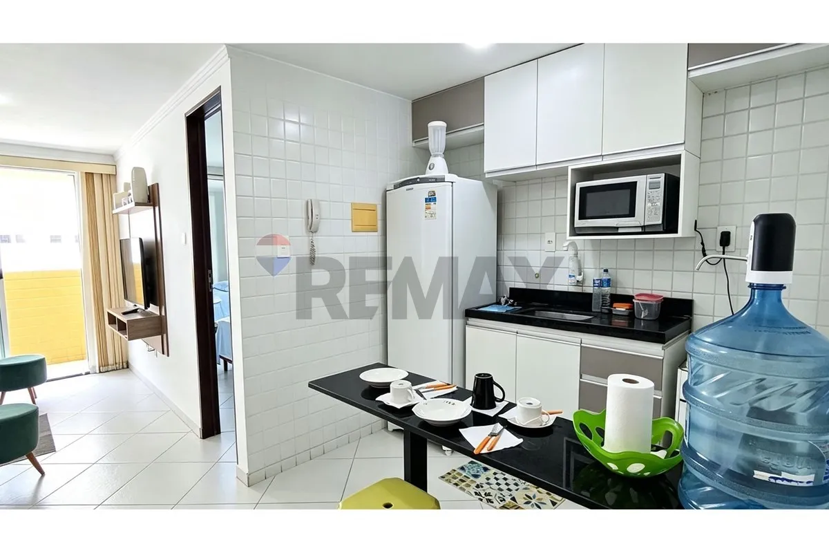 One-bedroom apartment in a building with a pool — photo 2