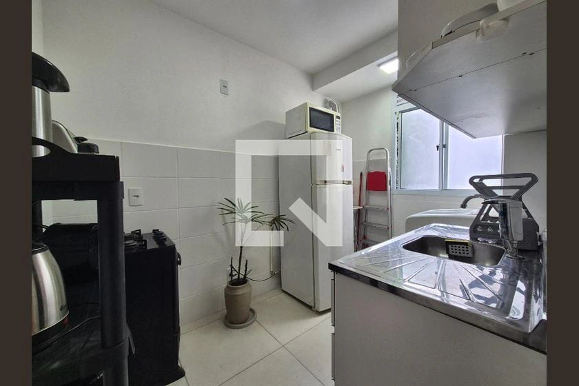 Furnished 2-bedroom apartment with an open-plan kitchen — photo 32
