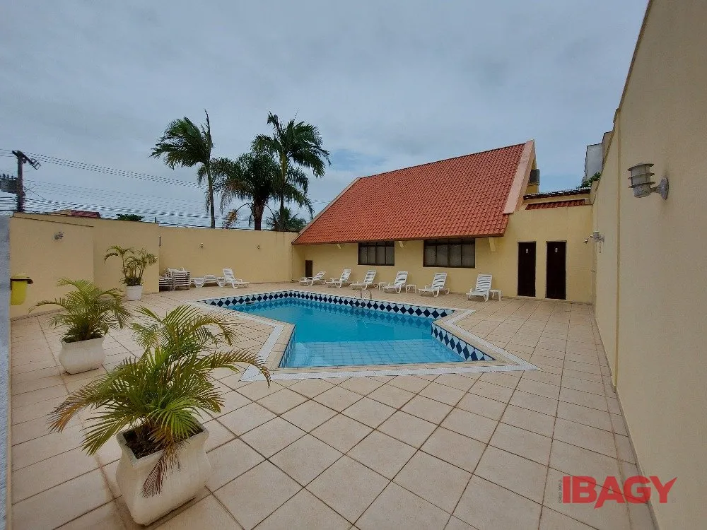 2-bedroom apartment in a building with a pool
