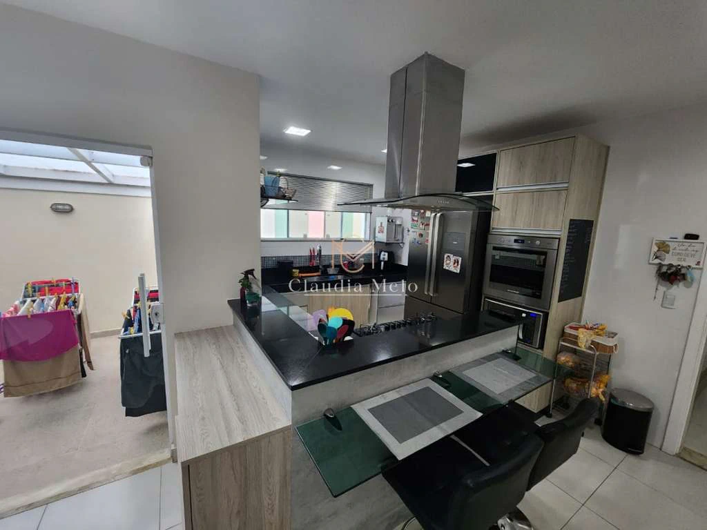 Casa em condomínio com 3 suítes e 370 m², cozinha integrada — photo 11