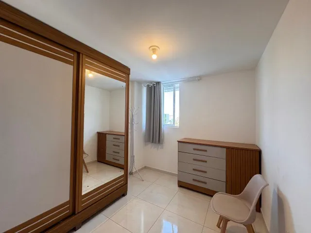 2-bedroom apartment in a building with a pool — photo 7