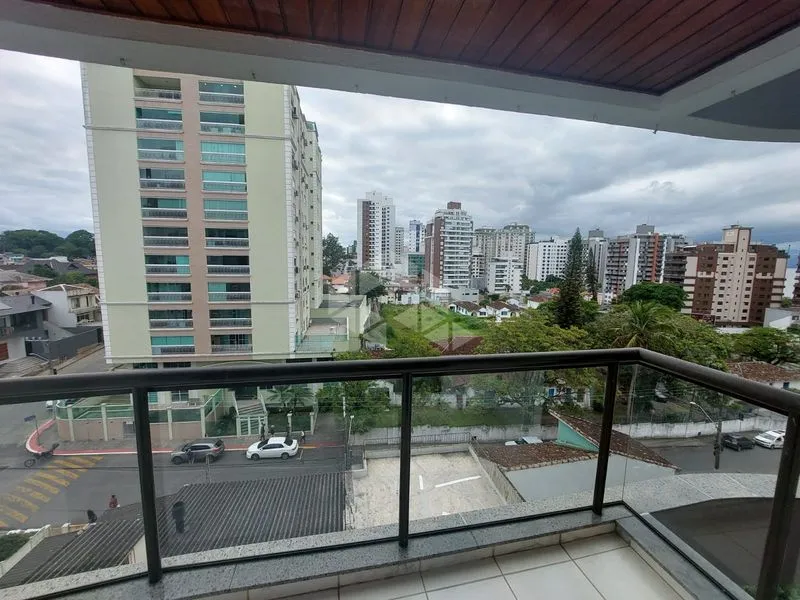 3-bedroom apartment in a building with a pool