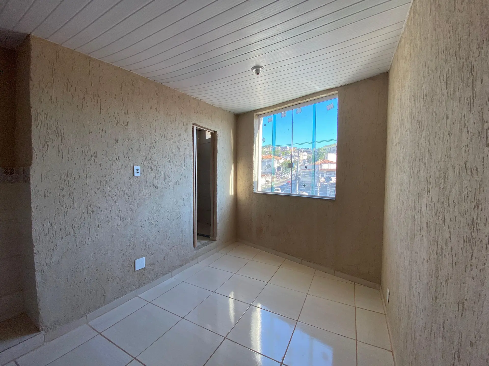 1-bedroom apartment with no parking, city-facing windows — photo 6
