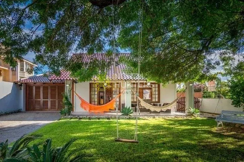 Casa com 4 dormitórios, 2 suítes e churrasqueira na varanda — photo 3