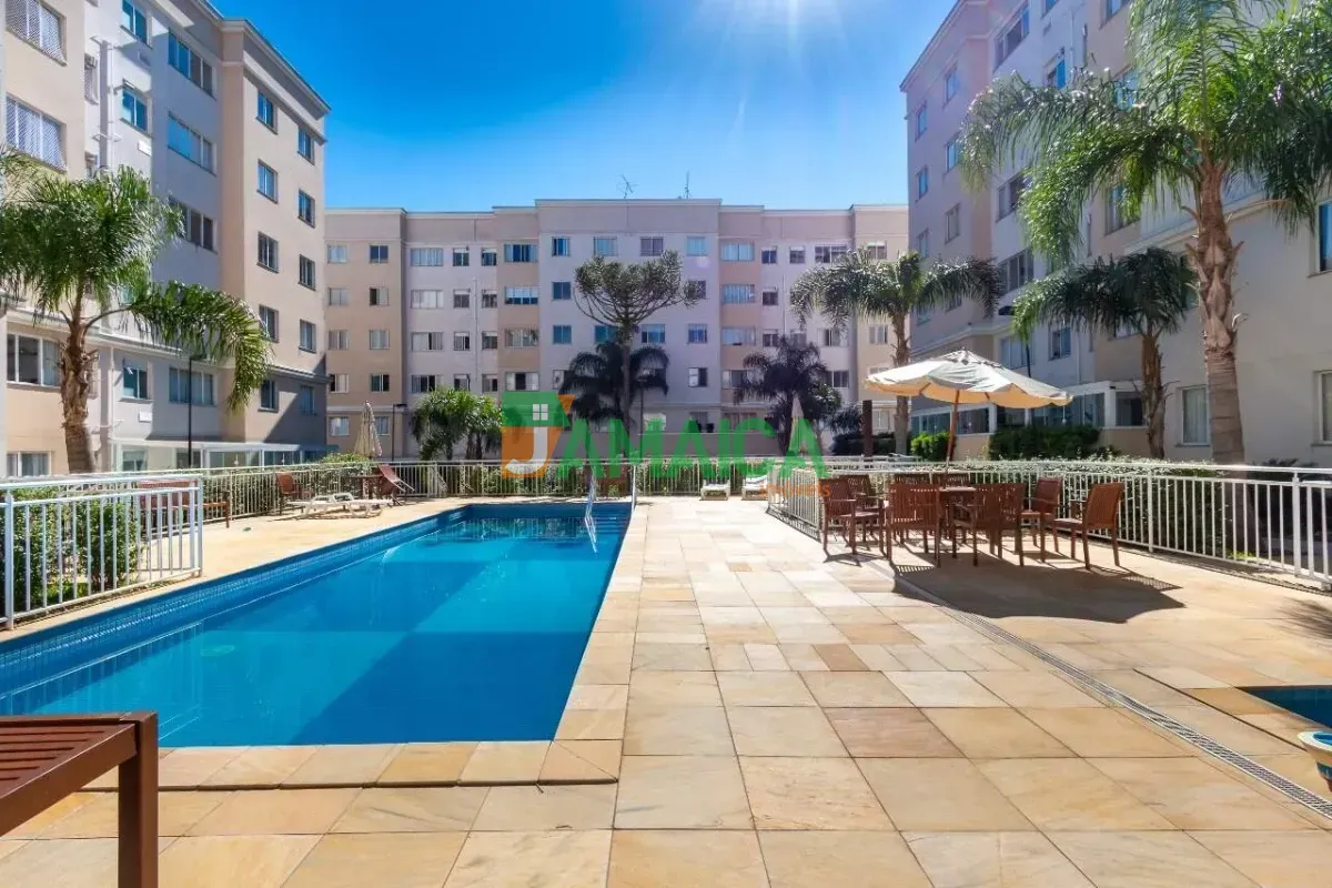2-bedroom apartment in a building with a pool — photo 24