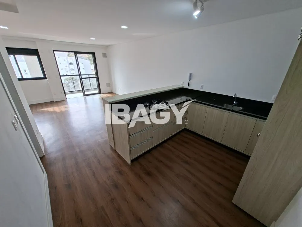 1-bedroom loft with open kitchen and balcony grill — photo 8