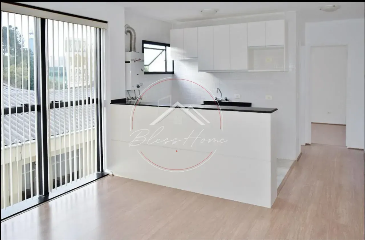 1-bedroom apartment with open kitchen and parking spot