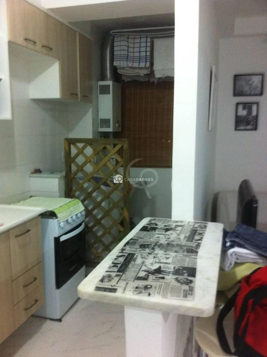 2-bedroom apartment in a building with a pool — photo 2