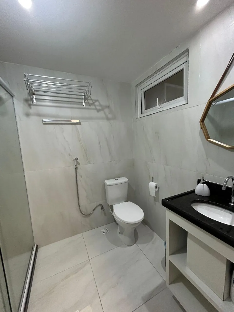 1-bedroom, 1-bath apartment with a compact kitchenette — photo 10