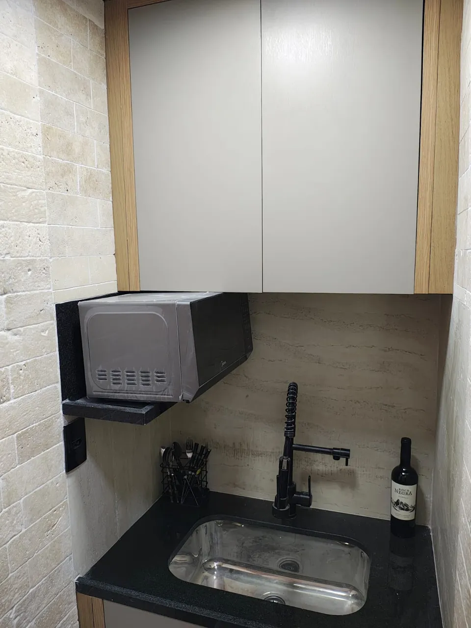 Apartamento de 1 quarto com varanda e 1 banheiro — photo 10