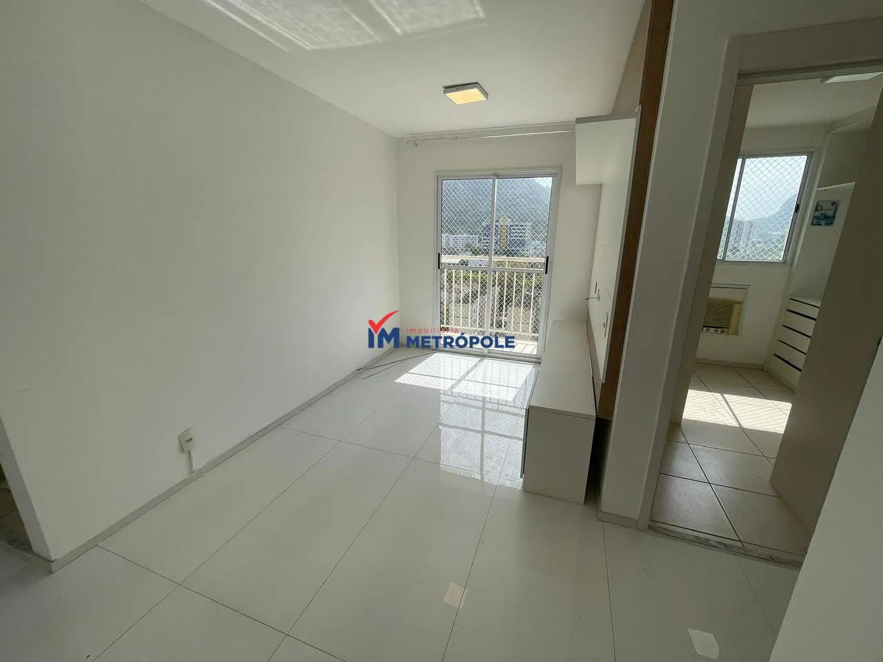 2-bedroom apartment in a building with a pool — photo 9