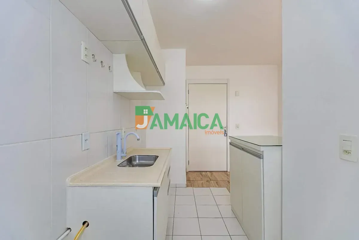 2-bedroom apartment in a building with a pool — photo 4