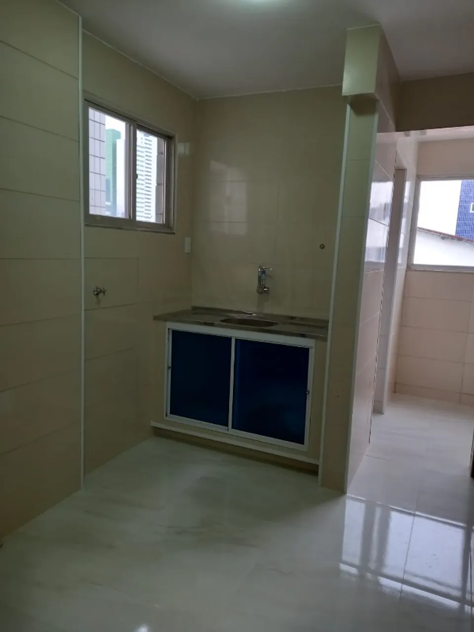3-bedroom apartment in a building with a pool — photo 2