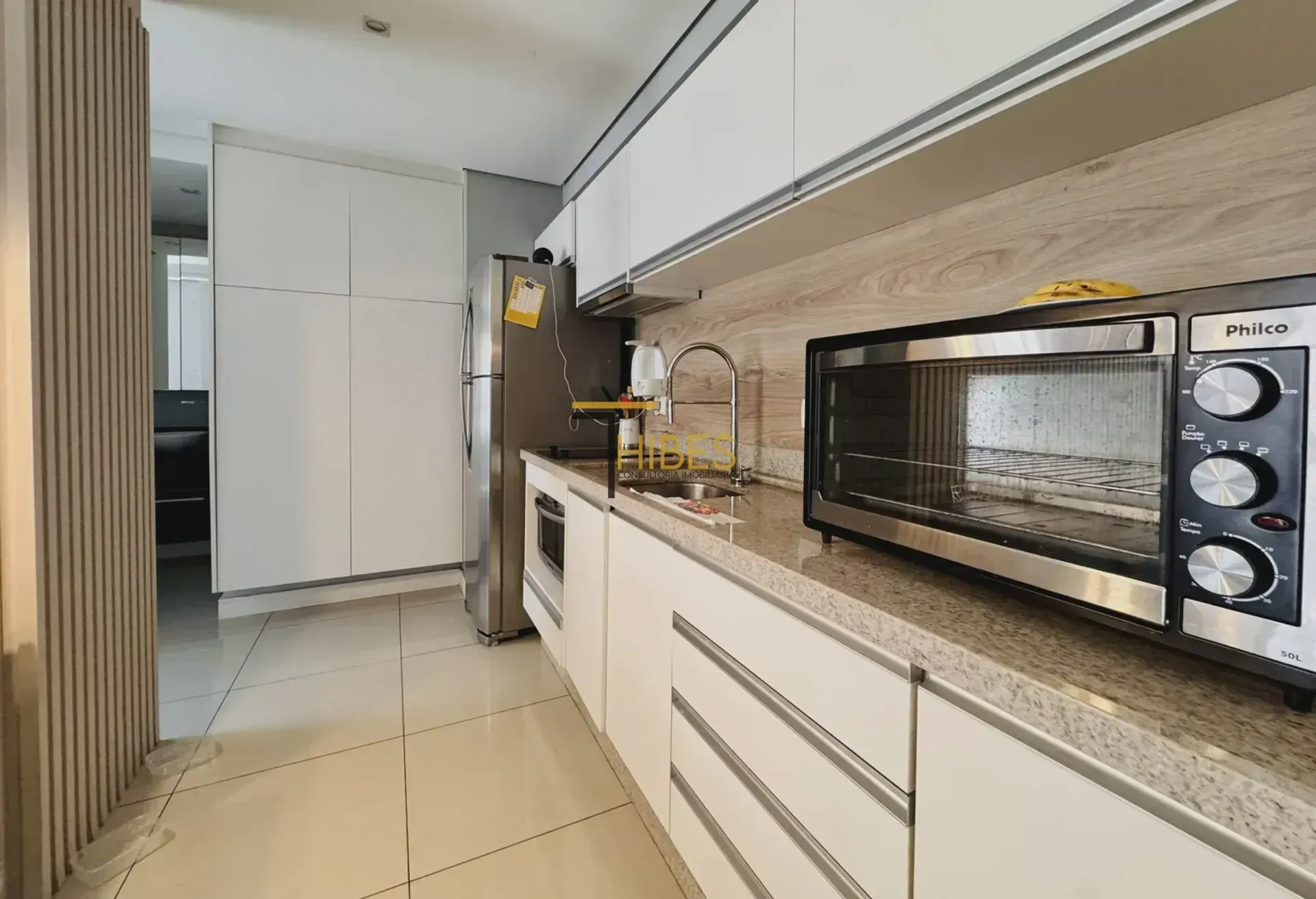 Apartamento de 1 dormitório com cozinha integrada e varanda — photo 15