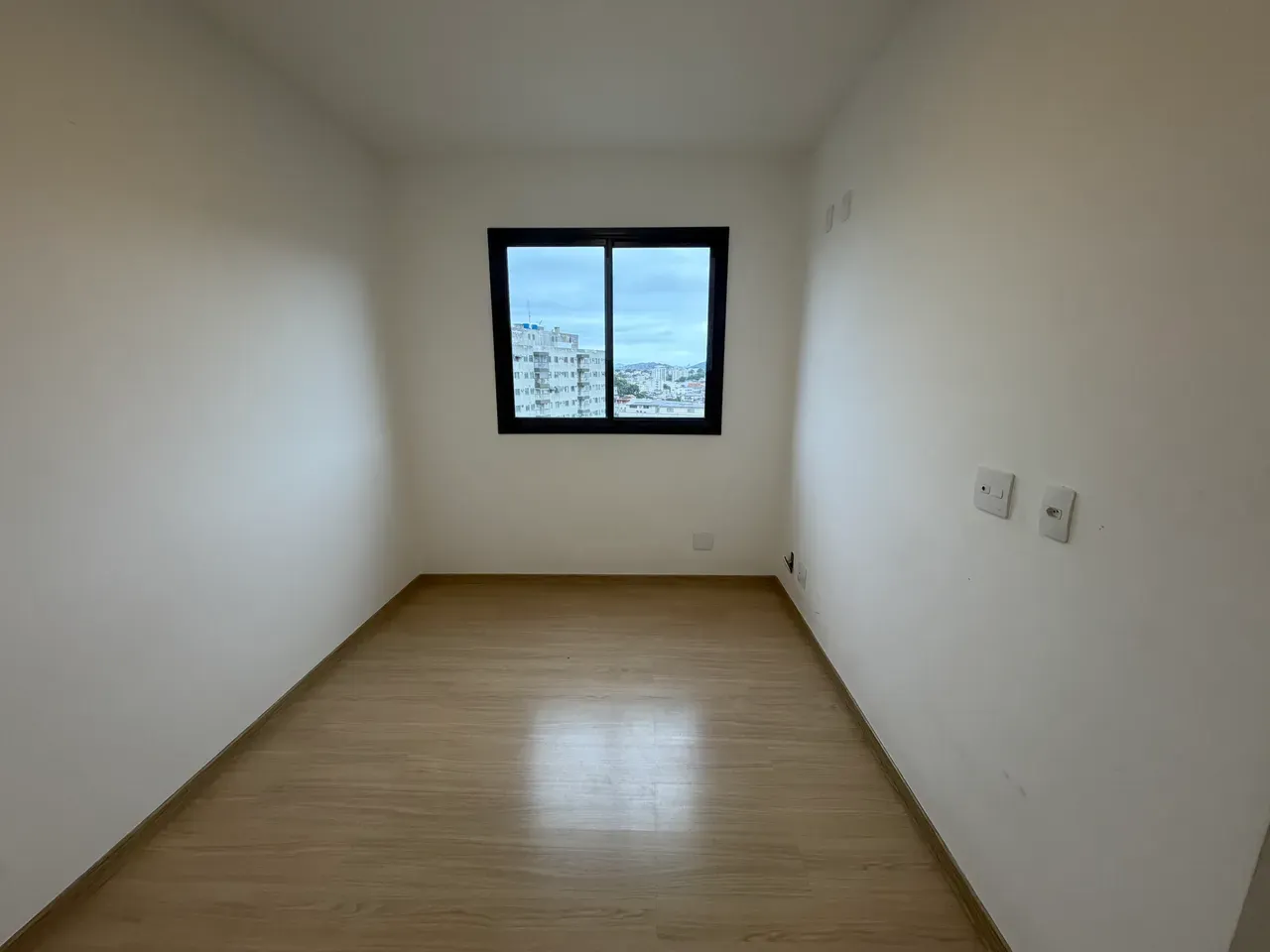 Wood or laminate floors in a 3-bedroom apartment, 69 m² — photo 11