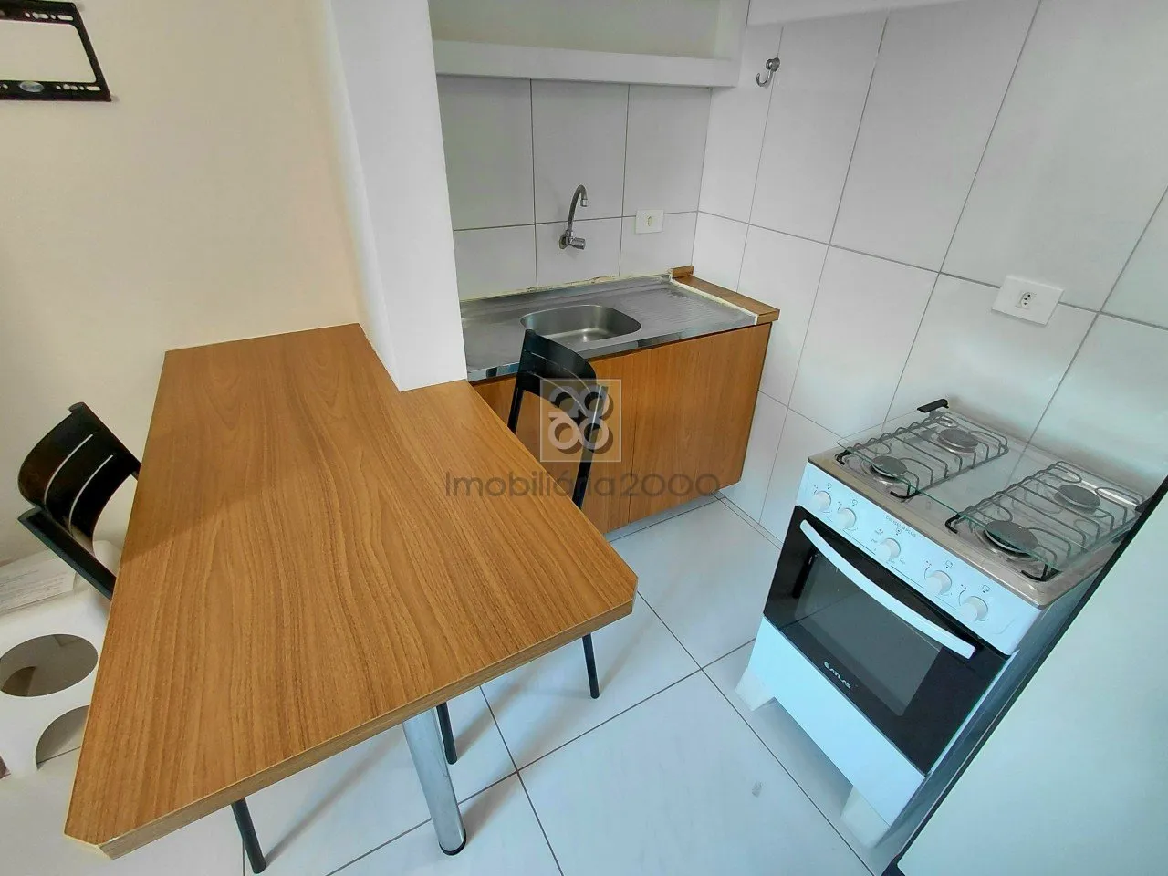 1-bedroom apartment with a compact kitchenette corner — photo 12