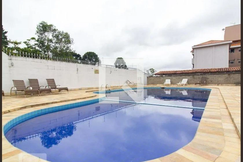 2-bedroom apartment in a building with a pool — photo 28